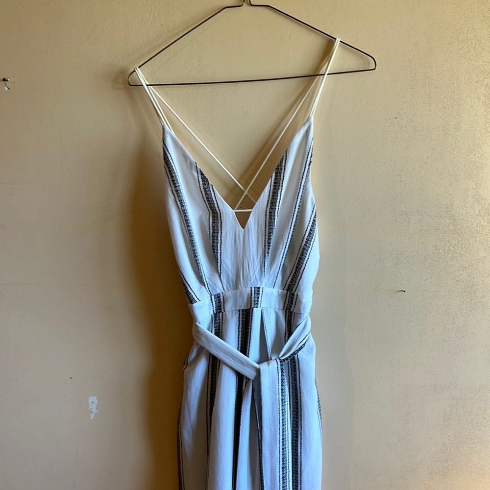 Flowy jumpsuit with spaghetti strap and slits in legs